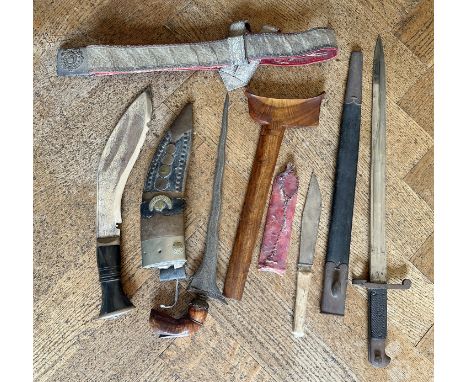 A SOUTH EAST ASIAN KRIS DAGGER&nbsp;probably Malaysian late 19th/early 20th century, with carved wood handle and scabbard and