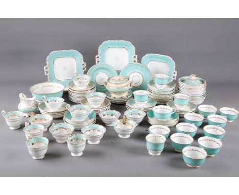 AN ENGLISH PORCELAIN PART TEA SERVICE19th century, the pale blue banding highlighted with gilding; together with another simi