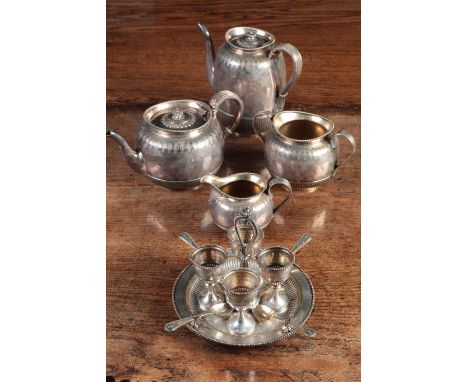 A VICTORIAN SILVER GILT FOUR PIECE TEA SERVICEby Elkington & Co., Birmingham 1869, the ovoid bodies with bead rims, leaf capp