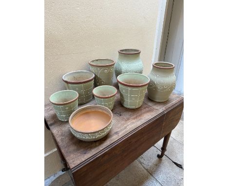 A COLLECTION OF DENBY STONEWARE GARDENWAREdecorated in pale green and highlighted in white, the largest vase measuring 32cm h