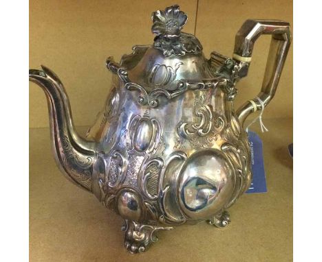VICTORIAN SILVER TEAPOT AND CREAM JUGthe teapot with floral finial, each on four feet, London marks, c.1845, maker CRGS, appr