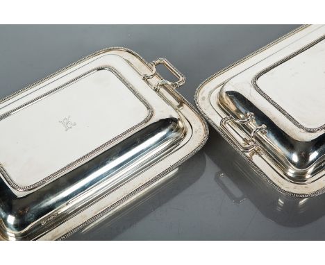 PAIR OF GEORGE V SILVER ENTREE DISHES
maker R & W Sorley, Sheffield 1926, with gardooned detail to rim, lids with two horizon