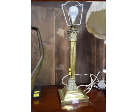 A brass Corinthian column table lamp, height excluding fitting 38cm.