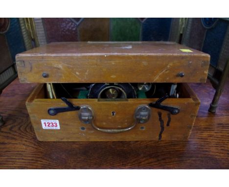 A surveyor's level, by Cooke Troughton & Simms Ltd, in fitted box; together with large tripod and telescopic measure. 