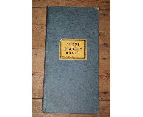 A boxwood and ebonized Staunton pattern chess set, in box; together with a set of dominoes and playing counters and chequer b