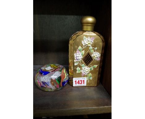 A Venetian scrambled latticino glass paperweight, 7.8cm diameter; together with a Continental gilt ruby glass scent bottle. 