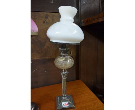 A Victorian electroplate Corinthian column oil lamp, approx 49cm high. 