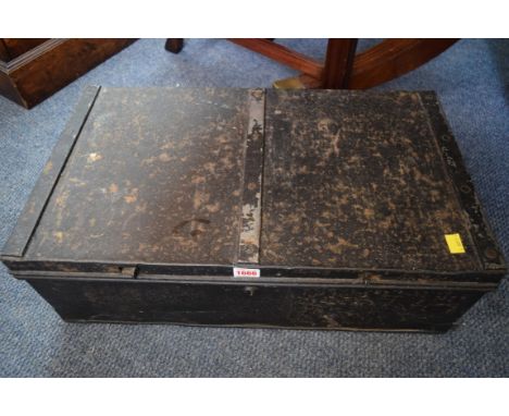 A World War II tin trunk, label to the interior 'Uttley Incham & Co Ltd 1941', with broad arrow stamp, 29.5cm wide.