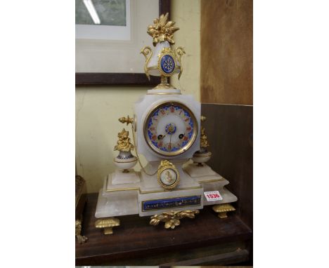 A late 19th century alabaster and gilt metal mounted mantel clock, 38.5cm high.