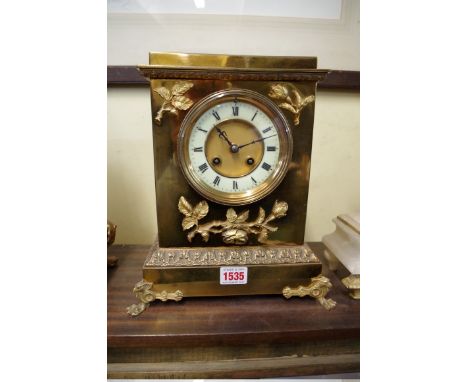 A circa 1900 brass mantel clock, 27.5cm high.