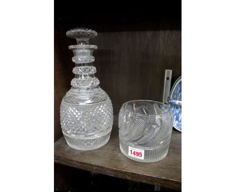 An early 19th century cut glass decanter and stopper; together with another. 