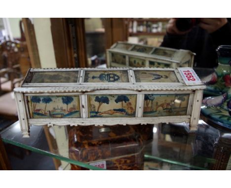 A rare Napoleonic bone prisoner of war cribbage box, with watercolour painted inset panels, 24cm wide. 