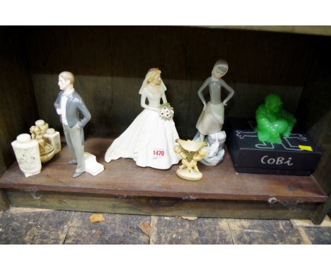 A mixed lot, to include two Goebel figures; and a Lladro figure. 