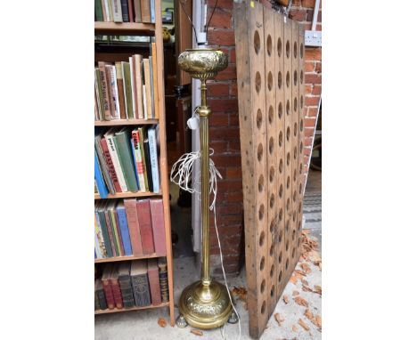 A brass standard lamp.