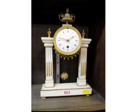 A Louis XVI white marble and gilt metal mounted portico clock, 37cm high.