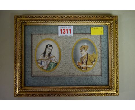 Indian School, half length portrait miniature of a gentleman; and companion, a pair, 6.6 x 3cm, framed as one.