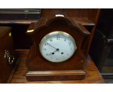 A late Victorian mahogany and line inlaid mantel clock, with circular and enamel dial, 37.5cm high. 