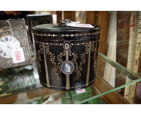 A late 18th century papier mache and inlaid oval tea caddy, labelled to base, 12.5cm wide. 