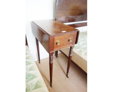 A REGENCY MAHOGANY SMALL PEMBROKE TABLE with rectangular drop flaps, end drawer with gilt brass handles, on ring turned taper