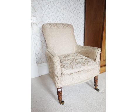 A WILLIAM IV SIMULATED ROSEWOOD LIBRARY CHAIR with upholstered tub-shaped back and arms, on ring-turned legs, brass toes and 