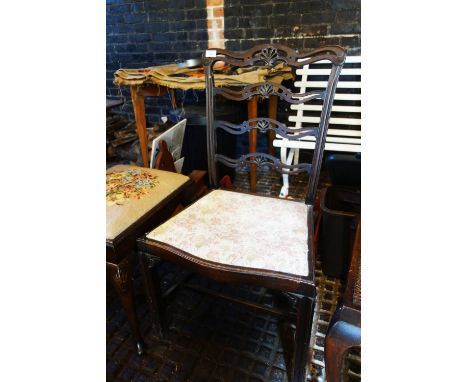 AN EDWARDIAN CHIPPENDALE REVIVAL DINING CHAIR with ladder back, a dressing stool with cane top and cabriole legs, and another