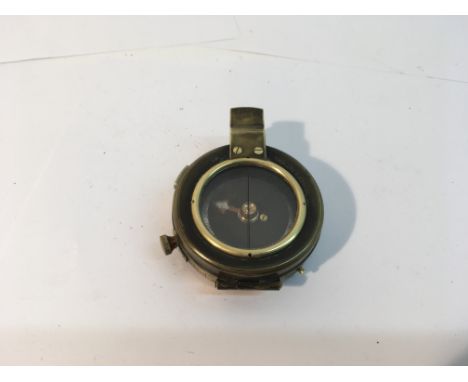 A 1917 War department marked compass, brass webs leather case made by Stocks of Edinburgh.