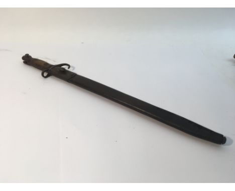 A 1907 pattern British bayonet with hooked quillion and very rare first patent scabbard, Enfield made with matching serial nu