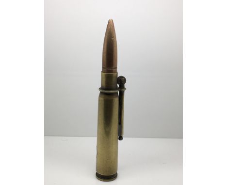 Trench Art. A WWII cigarette lighter made from a bullet.