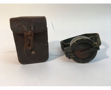 An unusual WW1 heavy compass in armoured type housing marked blacket type compass with serial numbers etc, complete with carr