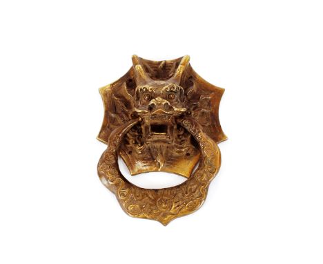 A Chinese&nbsp;bronzed door knocker,&nbsp;centered by a dragon mask and loop below, 18cm&nbsp;