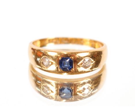 A gold sapphire and diamond set ring