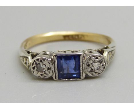 An Art Deco 18ct gold and platinum set diamond and blue stone ring, 2.3g, J 