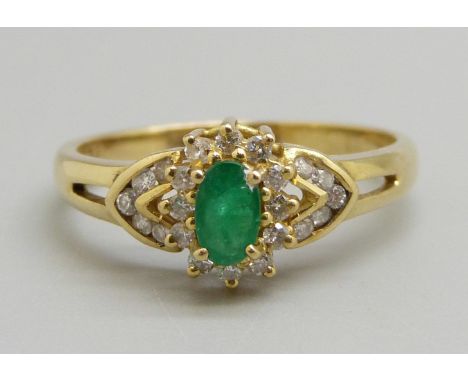 An emerald and diamond cluster ring, 3.1g, O, marked 18ct 