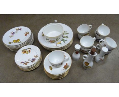 A collection of Royal Worcester Evesham dinnerwares including 6x 10" plates, 9x 8" plates, 7x 6" plates, 9x saucers, a bowl, 