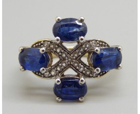 A silver gilt kyanite and zircon ring, L 