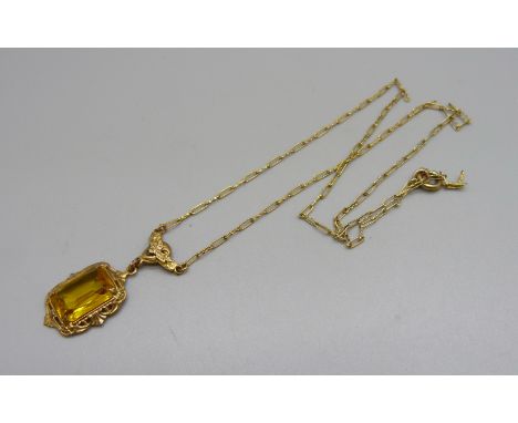 A vintage pendant and chain 