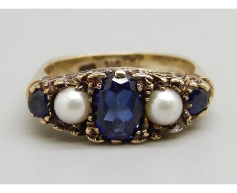 A yellow metal, sapphire and pearl ring, 4.7g, M, marked 9k 