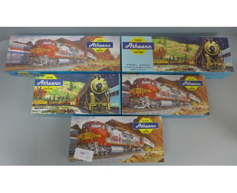 Five Athearn model locomotives; CSX New, Hustler Switcher, Union Pacific, U30C Power Pennsylvania and GN, boxed 