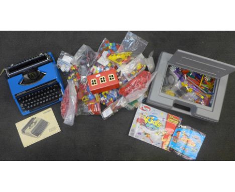 A collection of Lego and K-Nex and a Silver Reed typewriter 
