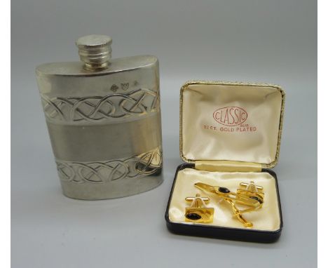 A pewter hip flask, made in Sheffield and a boxed set of 22ct gold-plated cufflinks and tie-clip 