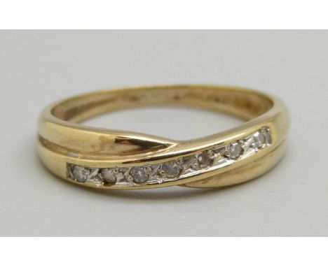 A 9ct gold seven stone diamond ring, 1.9g, N 