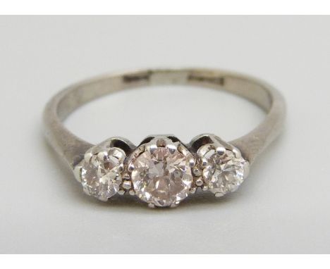 A white metal set diamond trilogy ring, 2.7g, O 