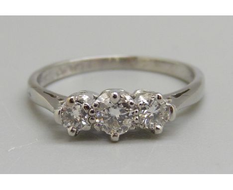 A platinum set three stone diamond ring, P, 4g, diamond weight circa 0.5cts 