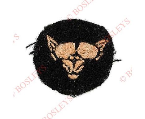 Badge. 10th Armoured Division WW2 cloth formation sign A good scarce example of pinky red fox’s mask embroidered on black dis