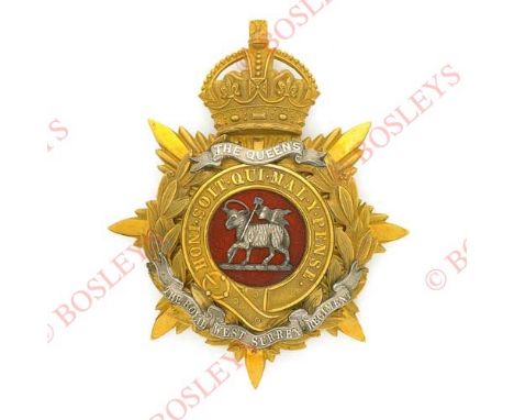 Badge. Queen’s Royal West Surreys Officer’s helmet plate circa 1911-14. A fine scarce gilt example by J & Co (Jennens). Crown