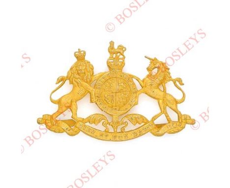 Badge. Royal Horse Guards post 1953 Officer’s pouch badge. A very fine rich gilt example being the Royal Arms. Three blades t