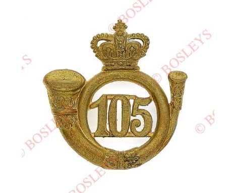 Badge. British Indian. 105th (Madras Light Infantry) Regiment, OR’s glengarry badge circa 1874-1881. A good die-stamped gilt 