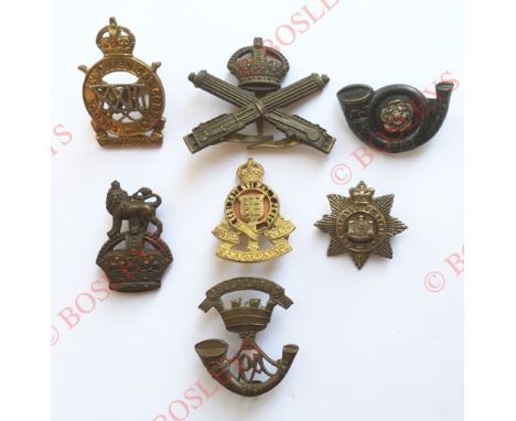 Badges. 7 assorted badges. Cap badges : 23rd London Armoured Car Company (cast on blades) ... Machine Gun Corps OSD (three bl