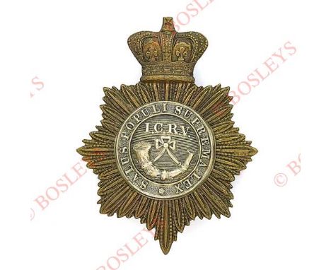 Badge. Inns of Court Rifle Volunteers Victorian shako plate. A good die-stamped blackened brass example. Crowned star mounted