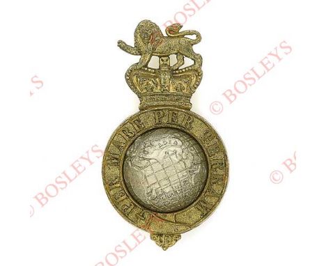 Badge. Royal Marine Light Infantry Victorian badge. A fine rare die-stamped brass example. Strap inscribed ‘Per Mare per Terr